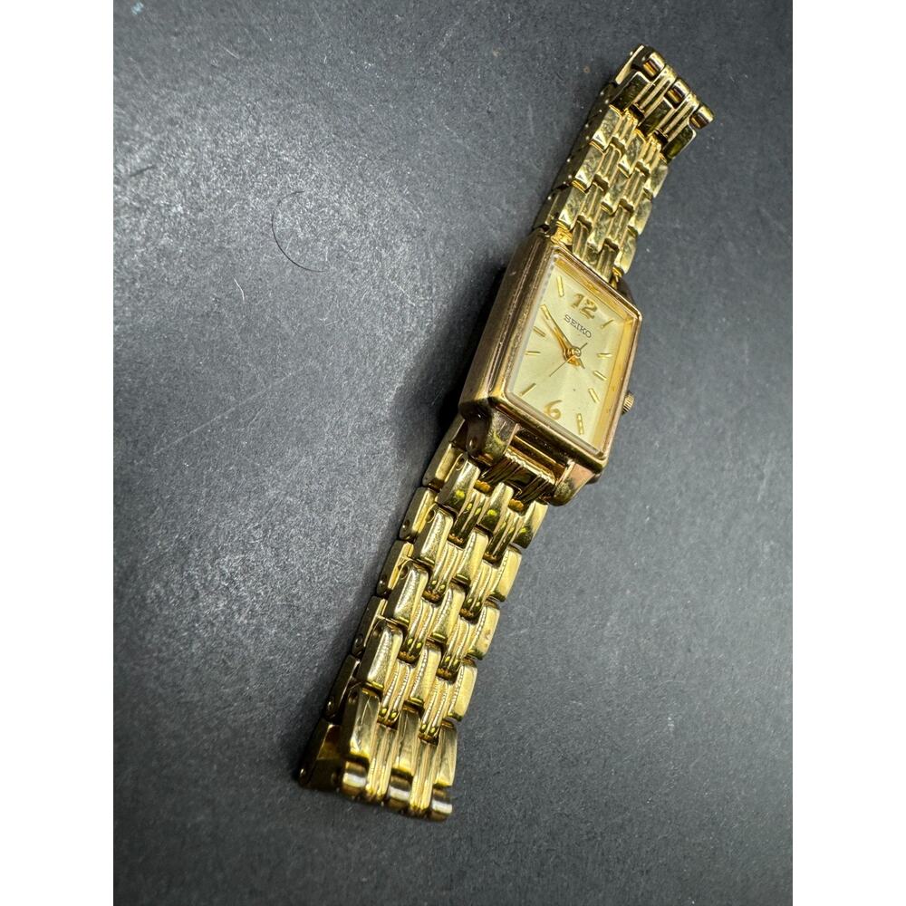 Seiko Tank Watch Women 16mm Champagne Dial Gold Tone Rectangle 1N01-0FH0 - Picture 4 of 8